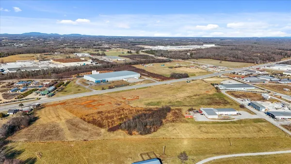 a view of balcony with wooden floor