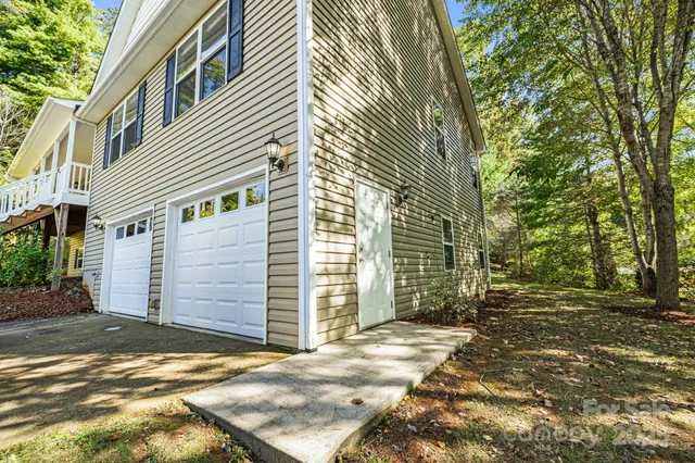 a view of a house with a street