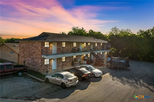 a car parked in front of a house