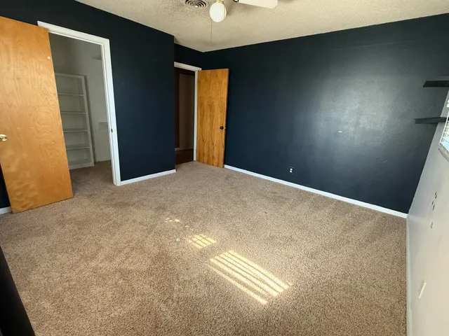 a view of kitchen with wooden floor