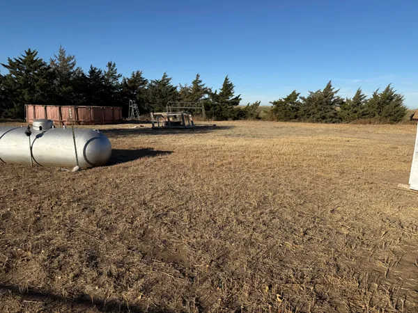 a view of a yard with an ocean view