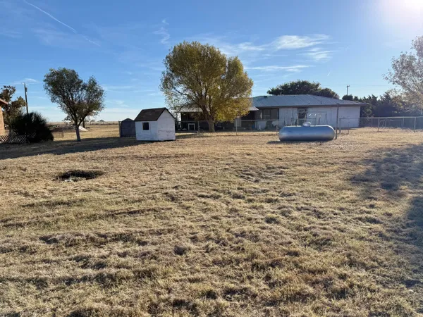 a view of gallery with wooden floor