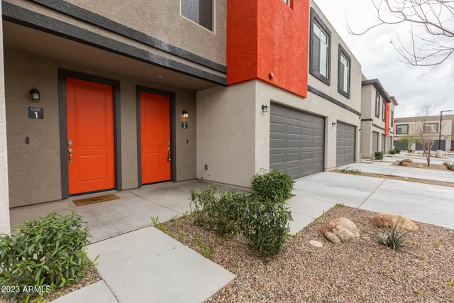 a view of kitchen with microwave and wooden floor