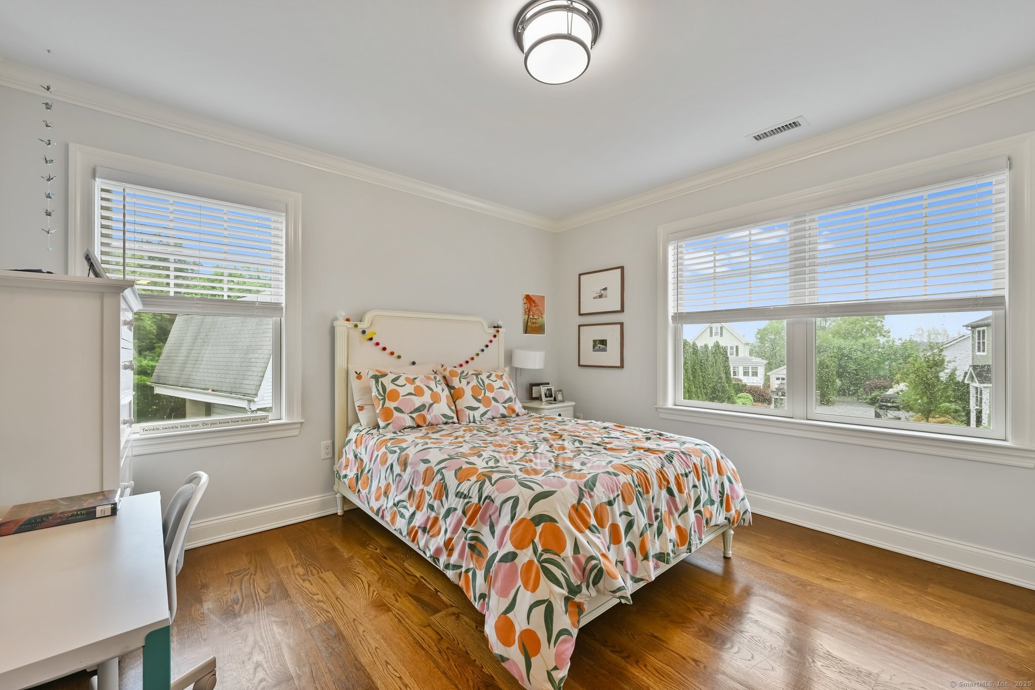 8 View Street, Unit 10 Greenwich, CT 06830 - Photo 16 of 29 a bedroom with a large bed and a large window