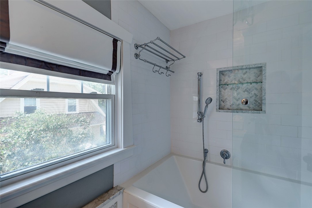 246 Oakley Road Woonsocket, RI 02895 - Photo 33 of 42 herringbone tile floor, tile shower