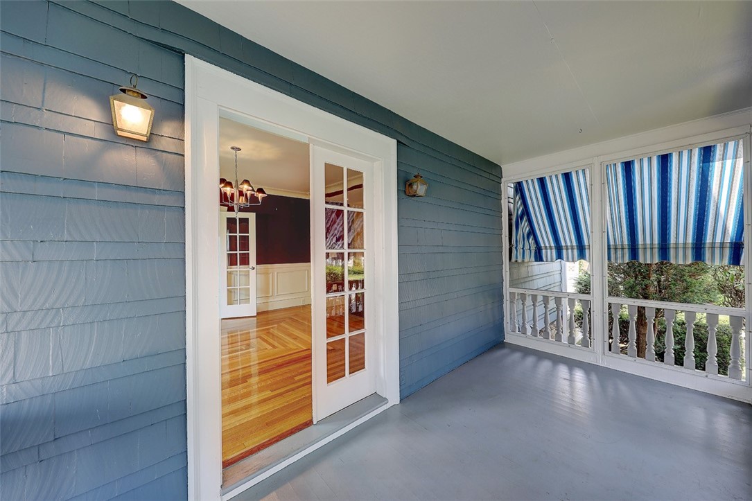 246 Oakley Road Woonsocket, RI 02895 - Photo 35 of 42 French doors from dining room leading out to the porch