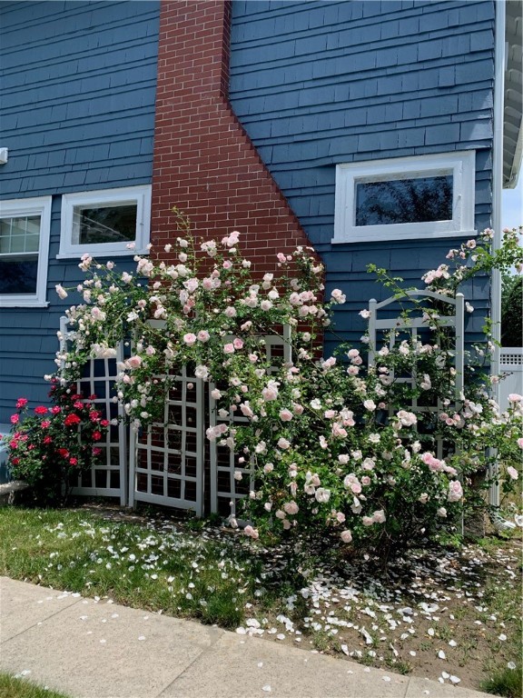 246 Oakley Road Woonsocket, RI 02895 - Photo 39 of 42 beautifully landscaped fenced in yard and rose bushes