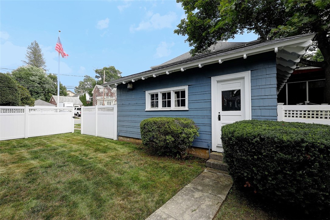 246 Oakley Road Woonsocket, RI 02895 - Photo 40 of 42 side entrance to the garage from fenced in yard