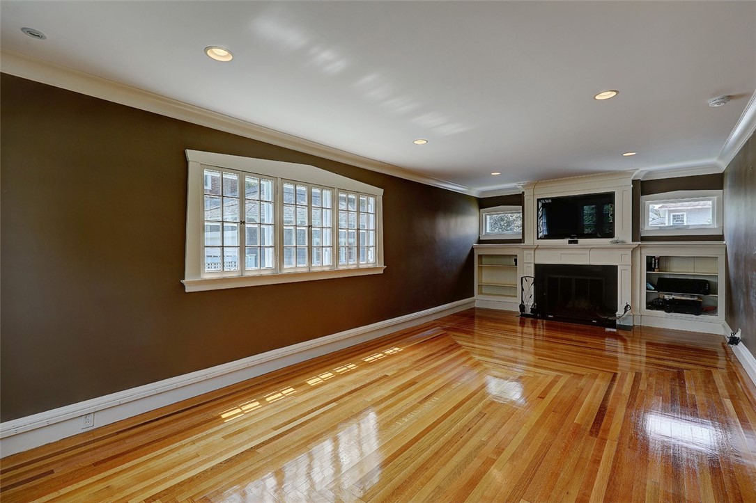 246 Oakley Road Woonsocket, RI 02895 - Photo 9 of 42 living room with custom built in shelves