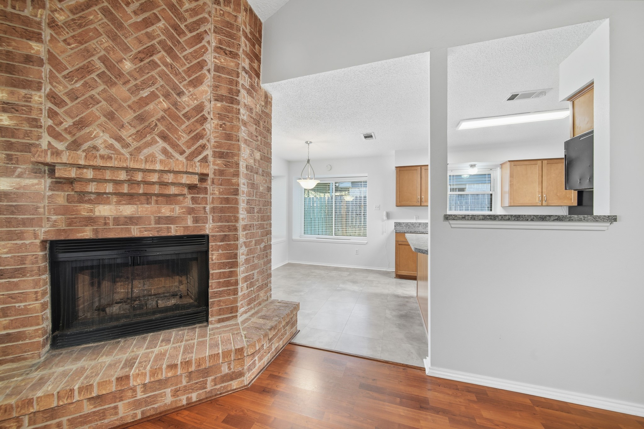 9518 Dundalk Street Spring, TX 77379 - Photo 19 of 46 a living room with a fireplace