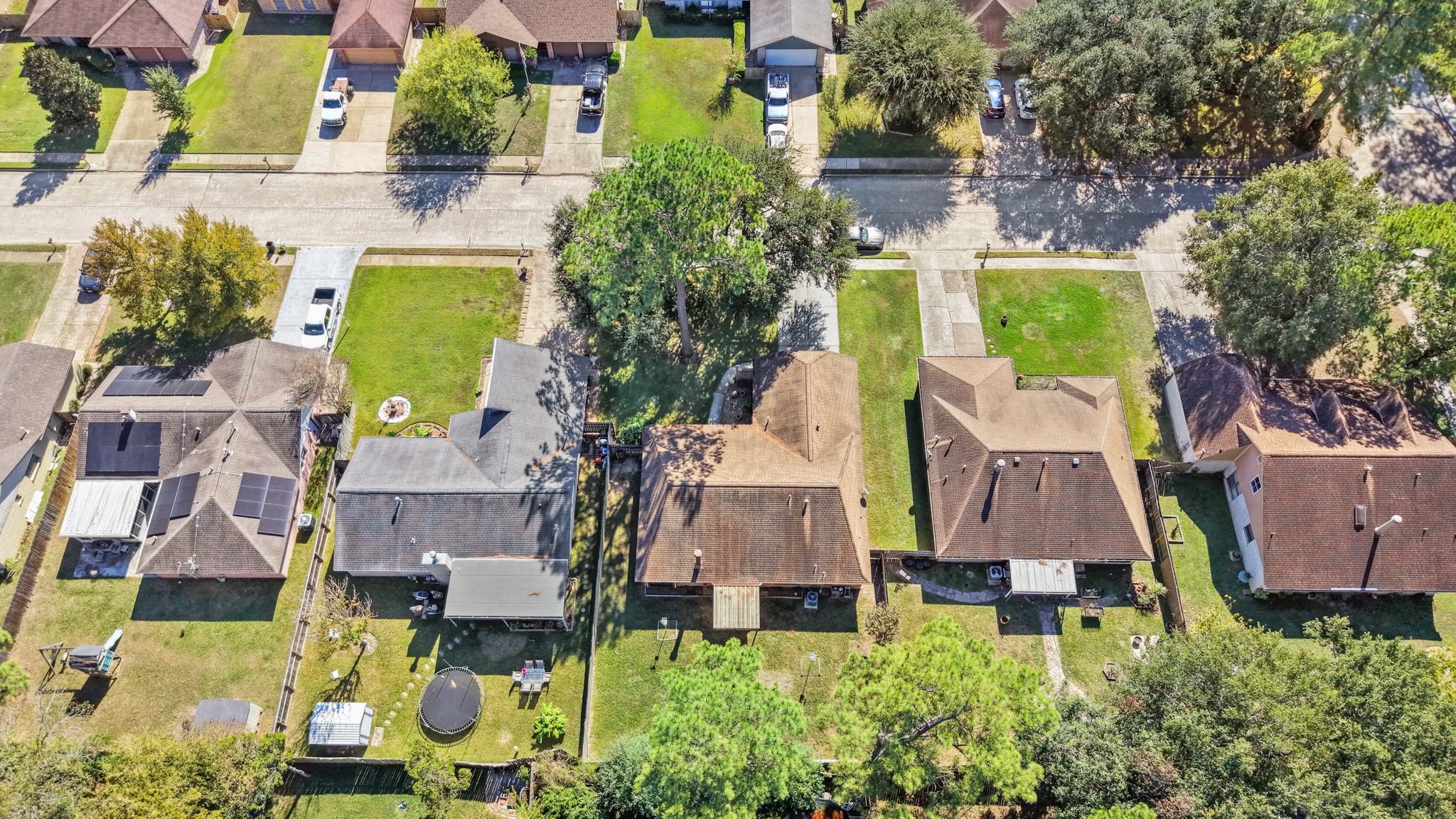 9518 Dundalk Street Spring, TX 77379 - Photo 42 of 46 an aerial view of residential houses with outdoor space