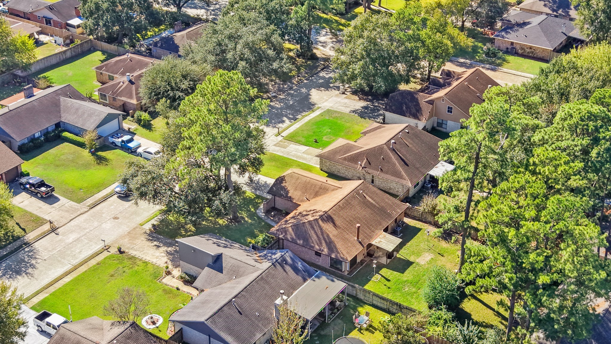 9518 Dundalk Street Spring, TX 77379 - Photo 45 of 46 an aerial view of residential house with outdoor space and swimming pool