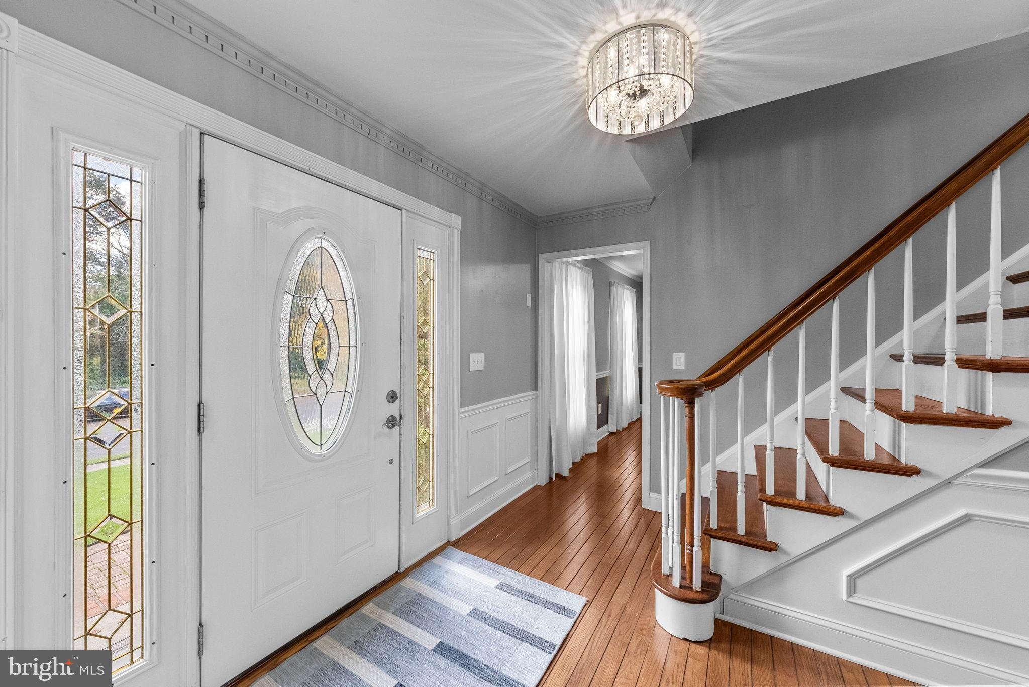 40 Doe Drive Hamilton, NJ 08620 - Photo 11 of 62 a view of a hallway with wooden floor and staircase