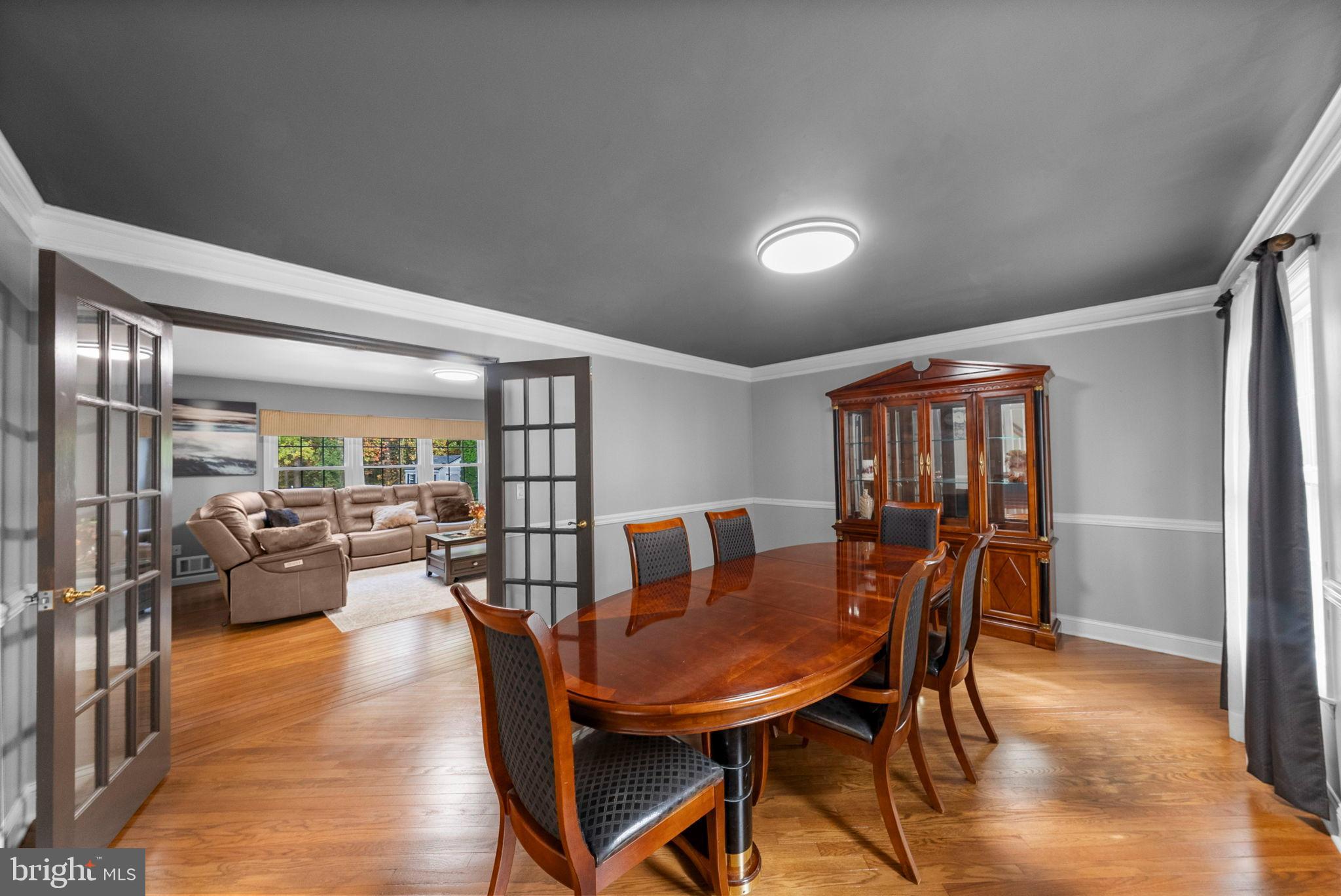40 Doe Drive Hamilton, NJ 08620 - Photo 22 of 62 a view of a dining room with furniture window and wooden floor