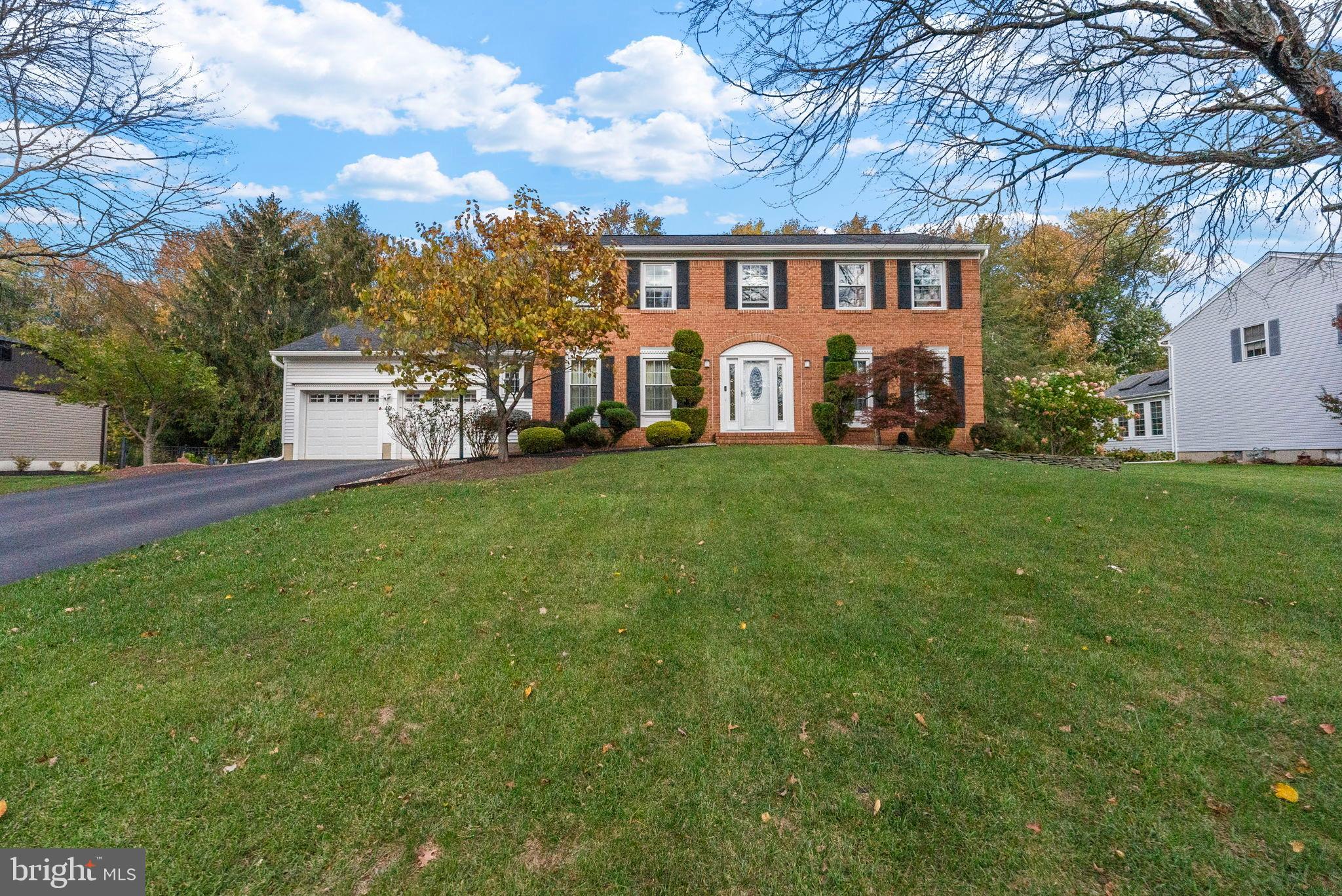40 Doe Drive Hamilton, NJ 08620 - Photo 3 of 62 a view of a yard in front of house