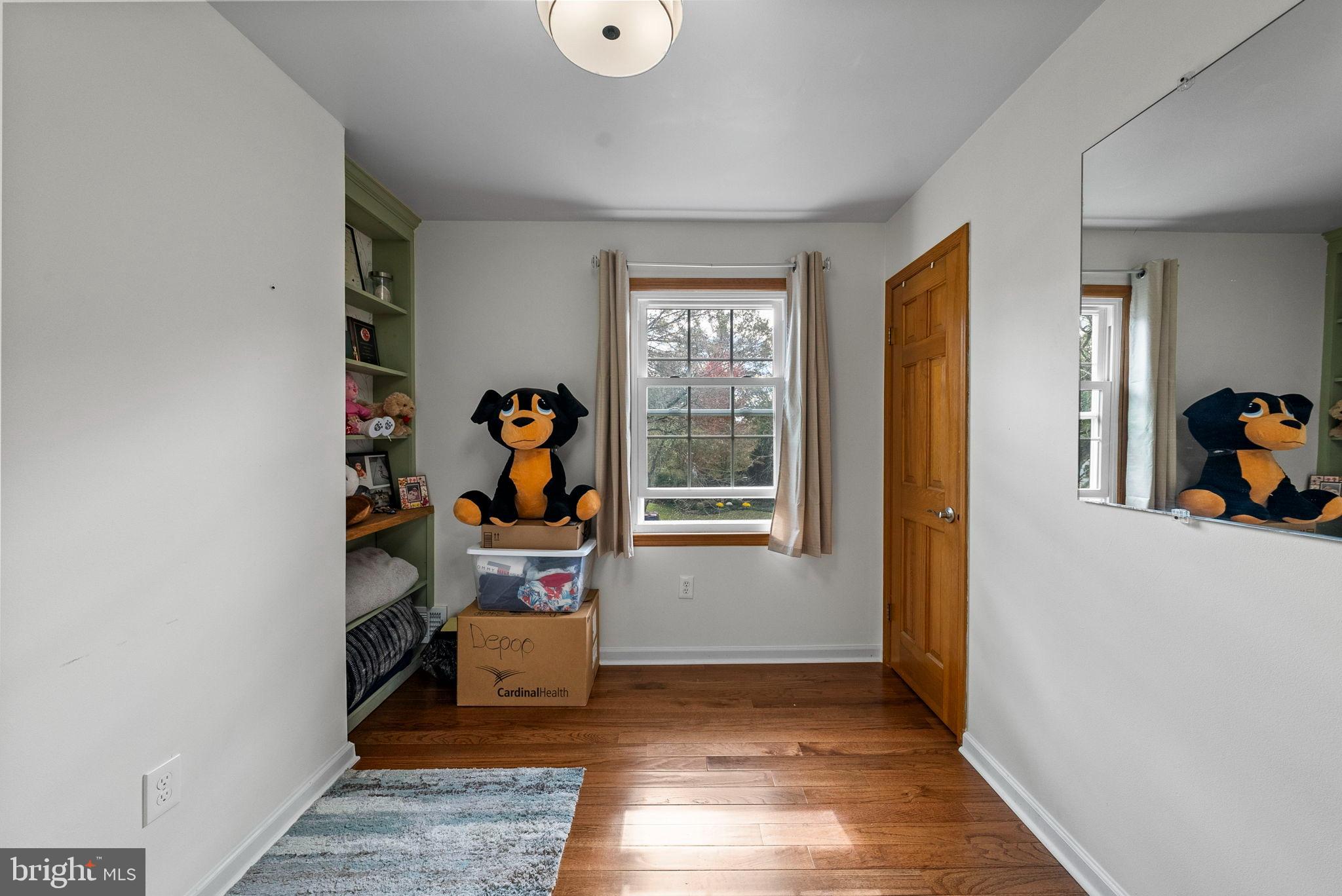 40 Doe Drive Hamilton, NJ 08620 - Photo 31 of 62 a view of room with window and wooden floor