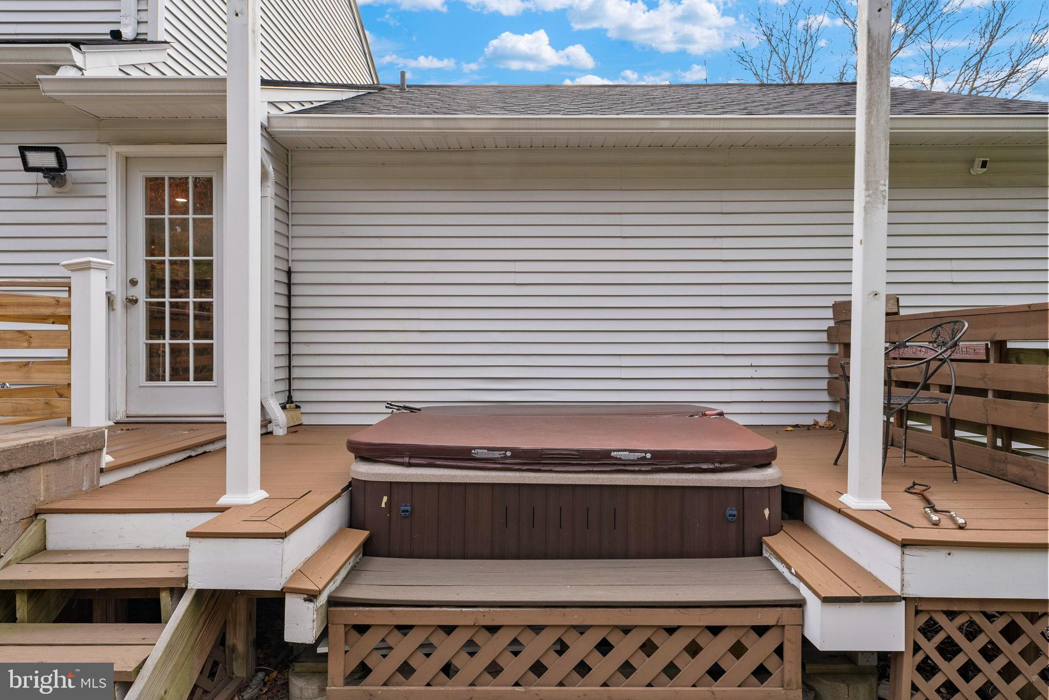 40 Doe Drive Hamilton, NJ 08620 - Photo 51 of 62 a view of a balcony with two chairs and a potted plant