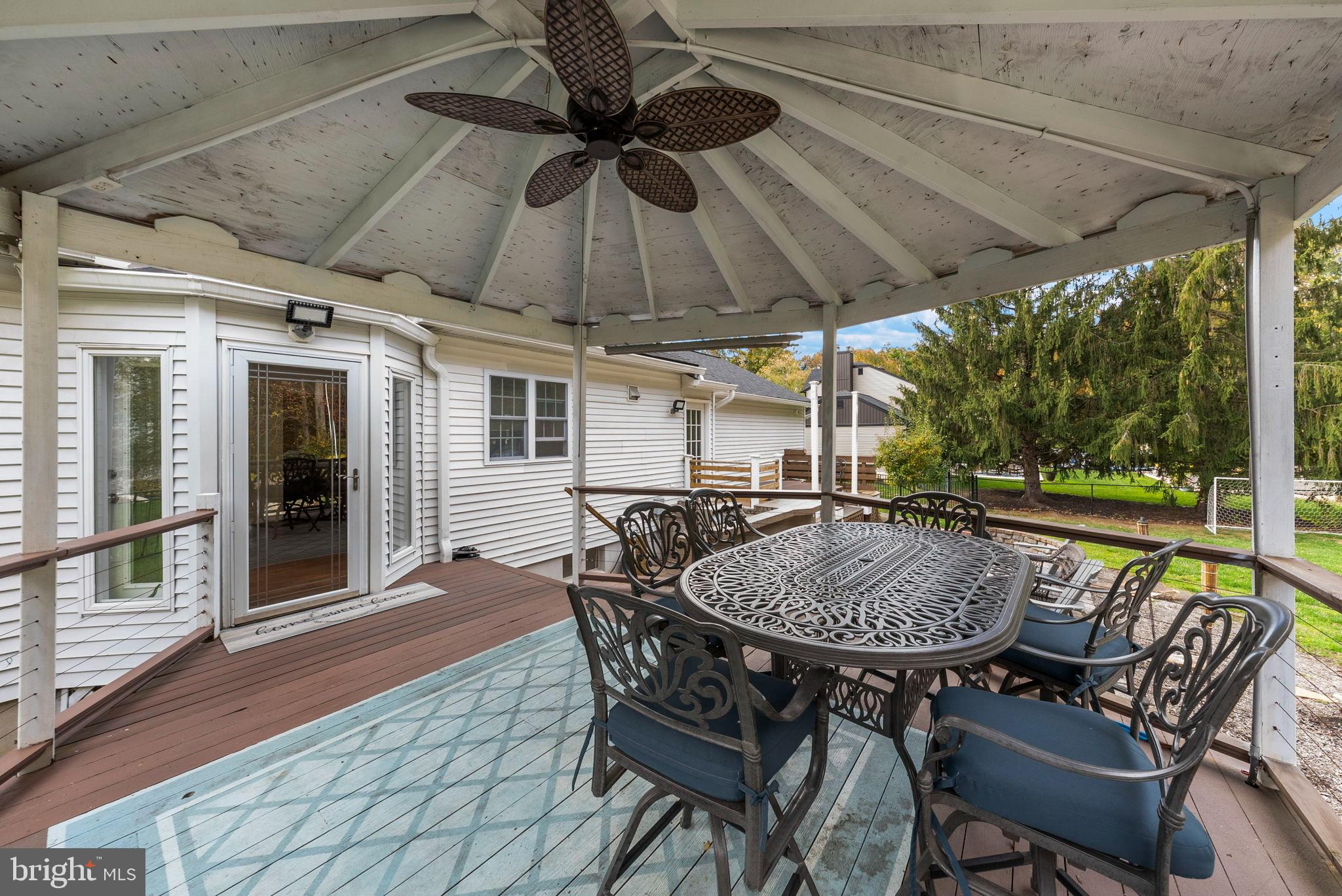 40 Doe Drive Hamilton, NJ 08620 - Photo 53 of 62 a patio with a table and chairs