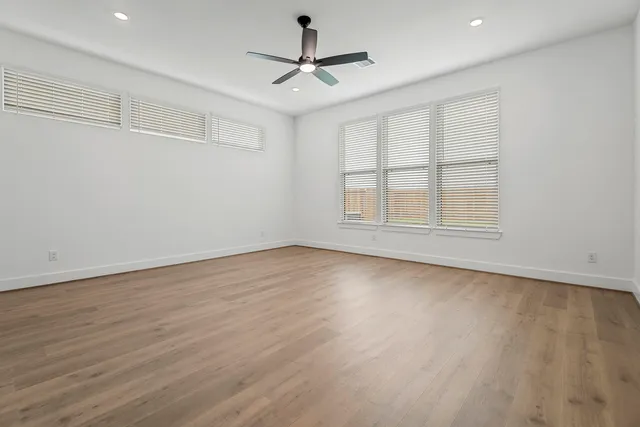 a bathroom with a double vanity sink and mirror