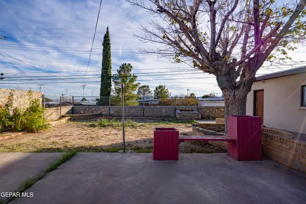 a view of a two chairs in patio