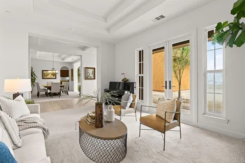 a kitchen with stainless steel appliances kitchen island granite countertop a refrigerator and a stove top oven
