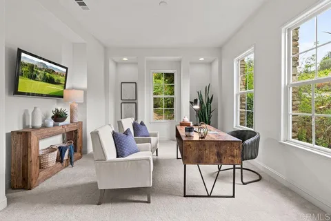 a living room with furniture or couch and a window