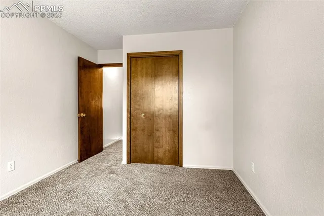 an empty room with closet