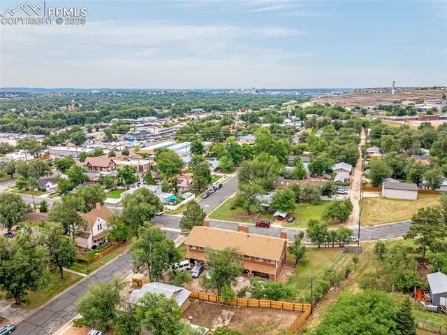an aerial view of a city with lots of residential buildings