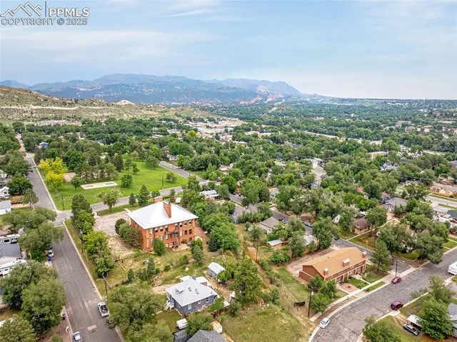 an aerial view of residential house with outdoor space