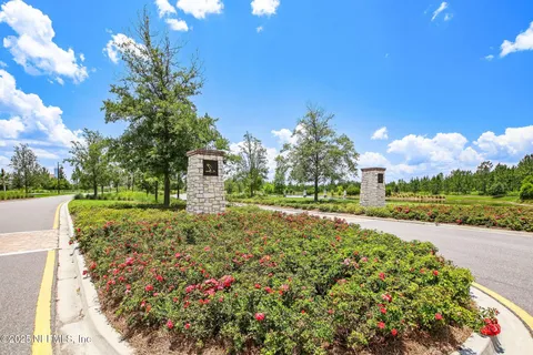 a view of house with swimming pool outdoor seating