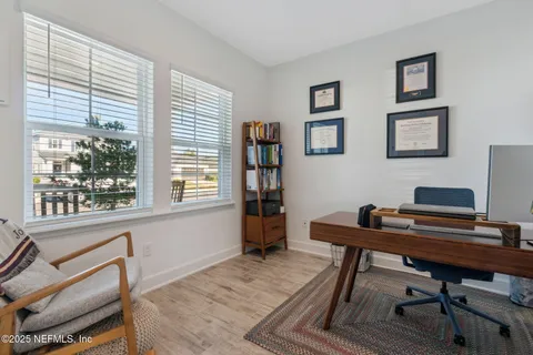 a stove top oven sitting inside of a kitchen