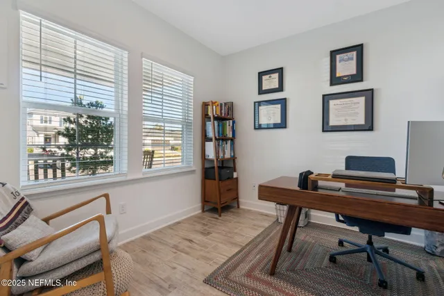 a stove top oven sitting inside of a kitchen