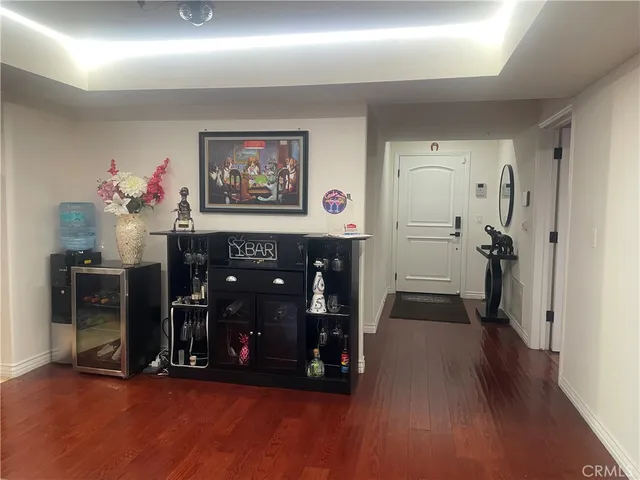 a view of a hallway with a living room