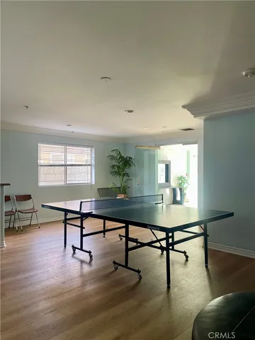 a view of a livingroom with furniture and a window