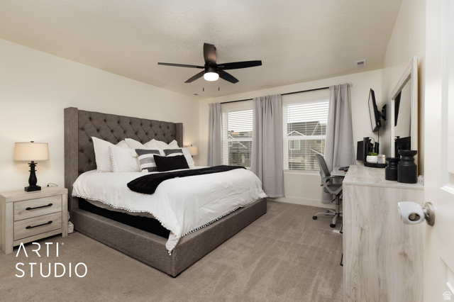 1713 South Windemere Road Santaquin, UT 84655 - Photo 13 of 40 Carpeted room featuring a ceiling fan with integrated lighting, two windows with blinds and drapes, and a white interior door with a brushed nickel knob