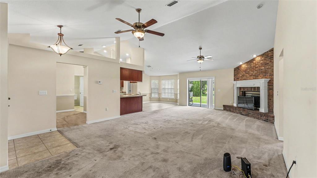 8525 North Campbell Road Lakeland, FL 33810 - Photo 38 of 45 a view of an empty room with a fireplace