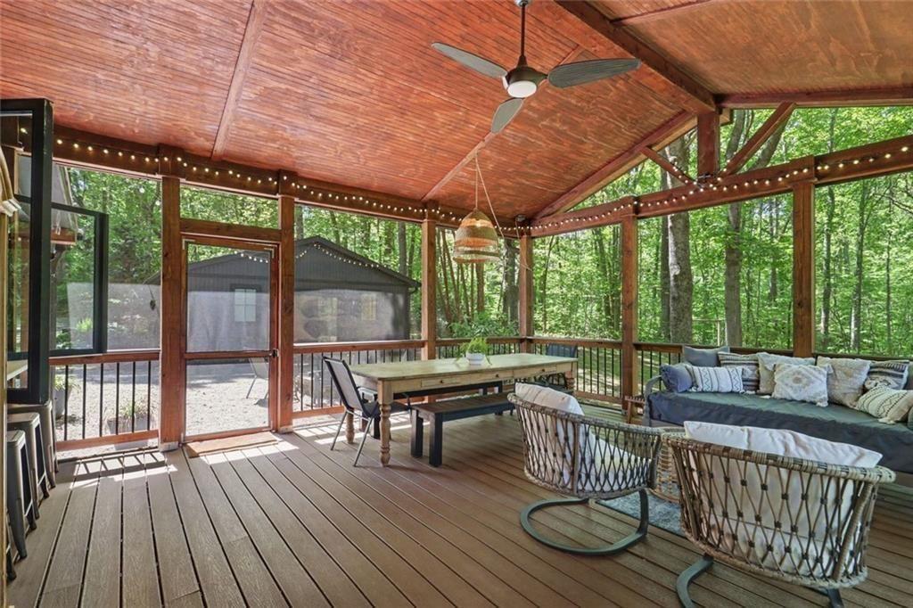 159 Manor Oak Trail Toccoa, GA 30577 - Photo 21 of 68 a outdoor space with patio lots of furniture and wooden floor