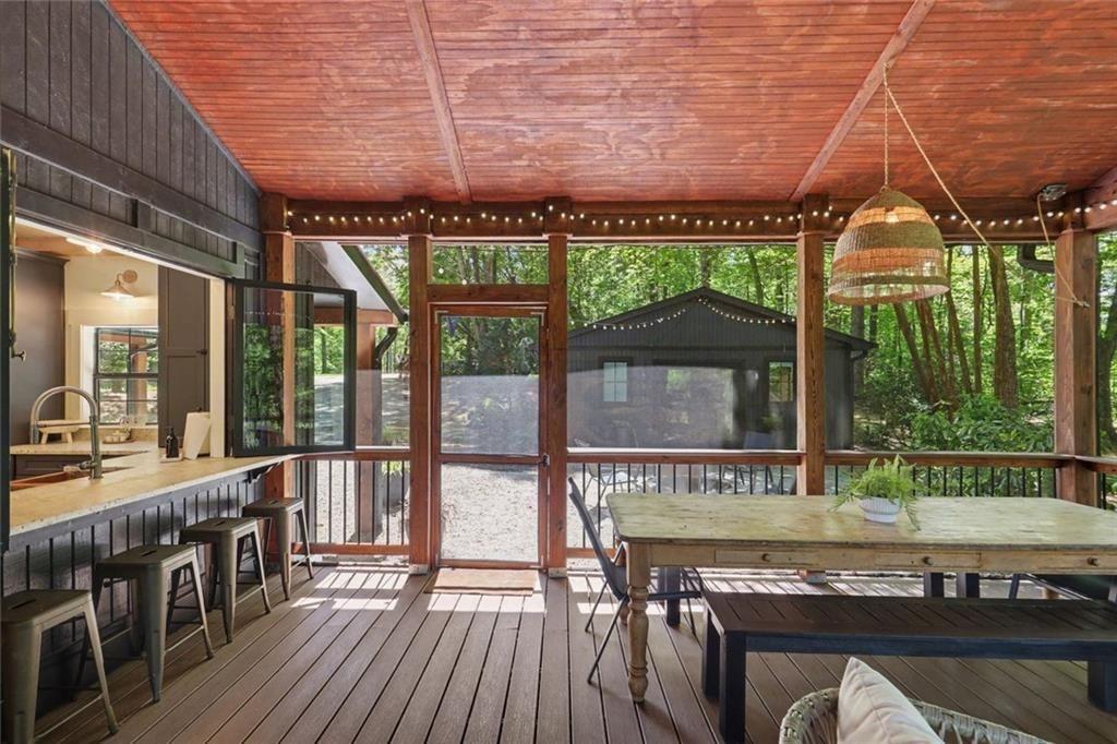 159 Manor Oak Trail Toccoa, GA 30577 - Photo 22 of 68 a view of a patio with a table and chairs