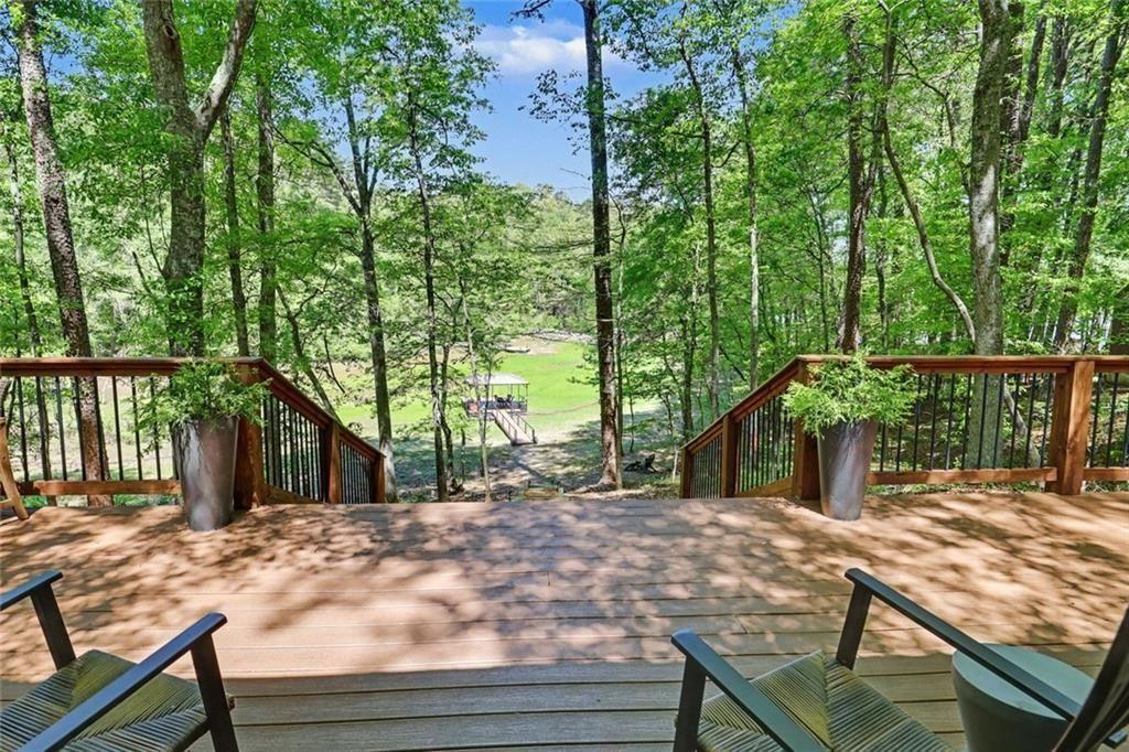 159 Manor Oak Trail Toccoa, GA 30577 - Photo 25 of 68 a view of a house with backyard and sitting area