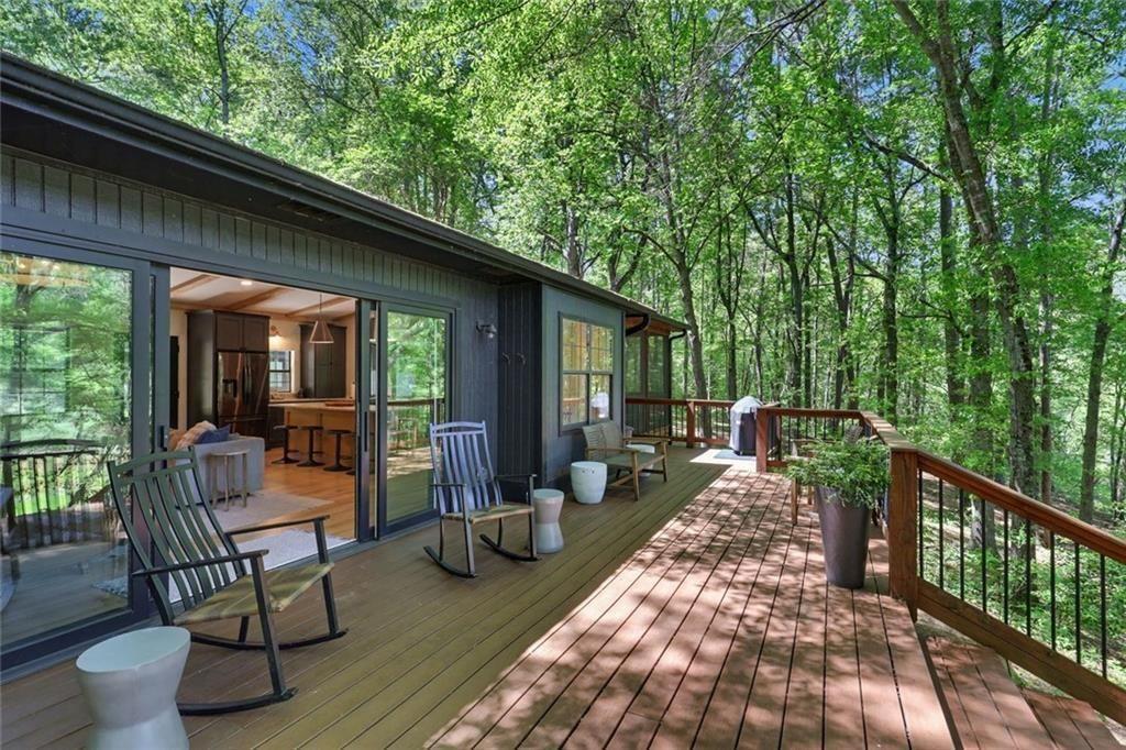 159 Manor Oak Trail Toccoa, GA 30577 - Photo 44 of 68 a view of a house with backyard sitting area and garden