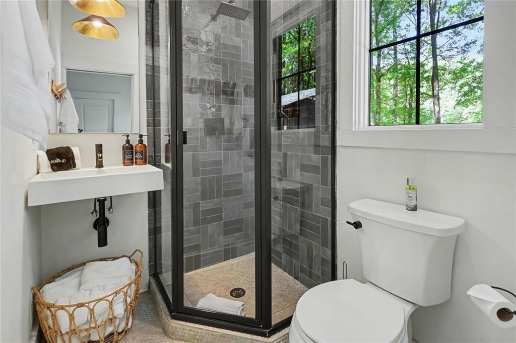 159 Manor Oak Trail Toccoa, GA 30577 - Photo 52 of 68 a bathroom with a toilet and a sink
