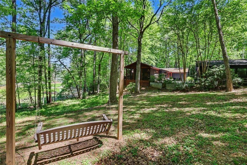 159 Manor Oak Trail Toccoa, GA 30577 - Photo 57 of 68 a view of a wooden deck with a yard