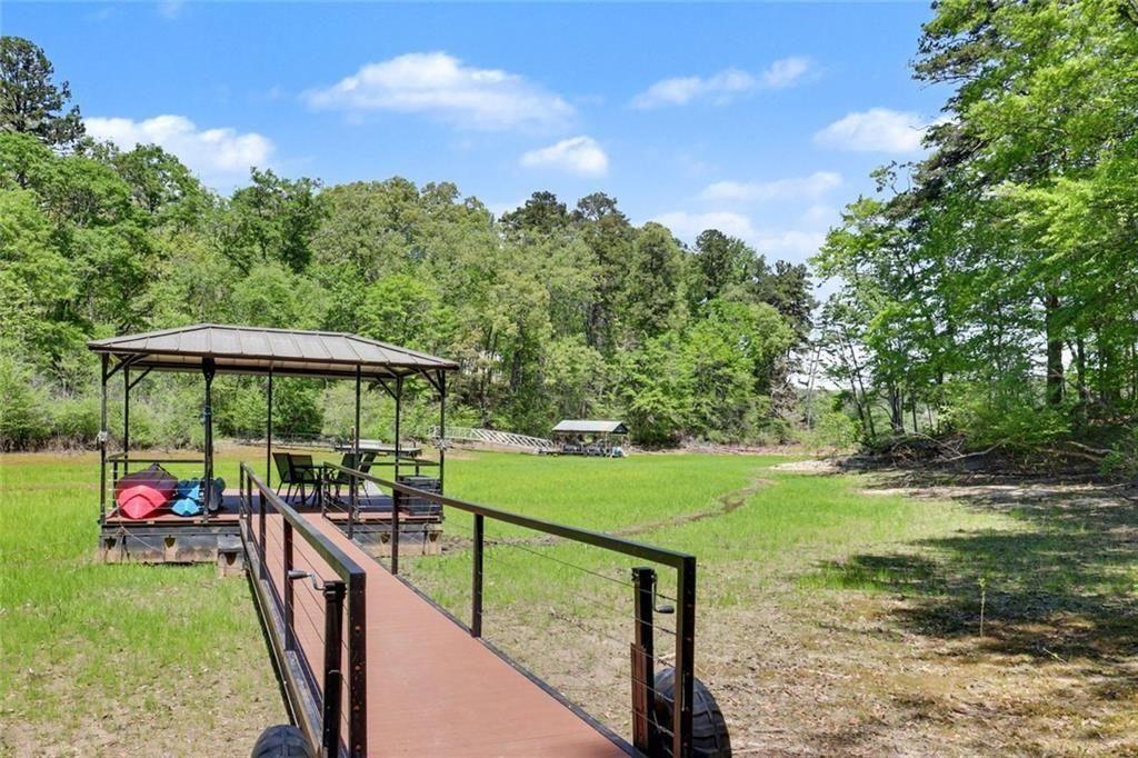 159 Manor Oak Trail Toccoa, GA 30577 - Photo 60 of 68 a view of a garden with cars parked