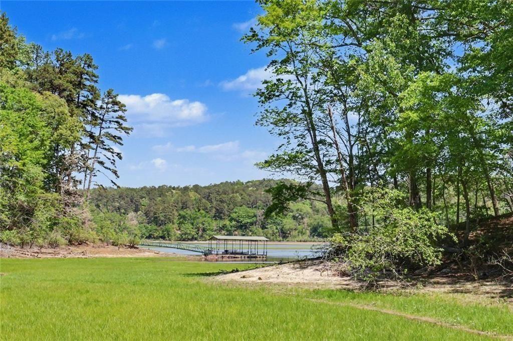 159 Manor Oak Trail Toccoa, GA 30577 - Photo 62 of 68 a view of a lake with houses in the back