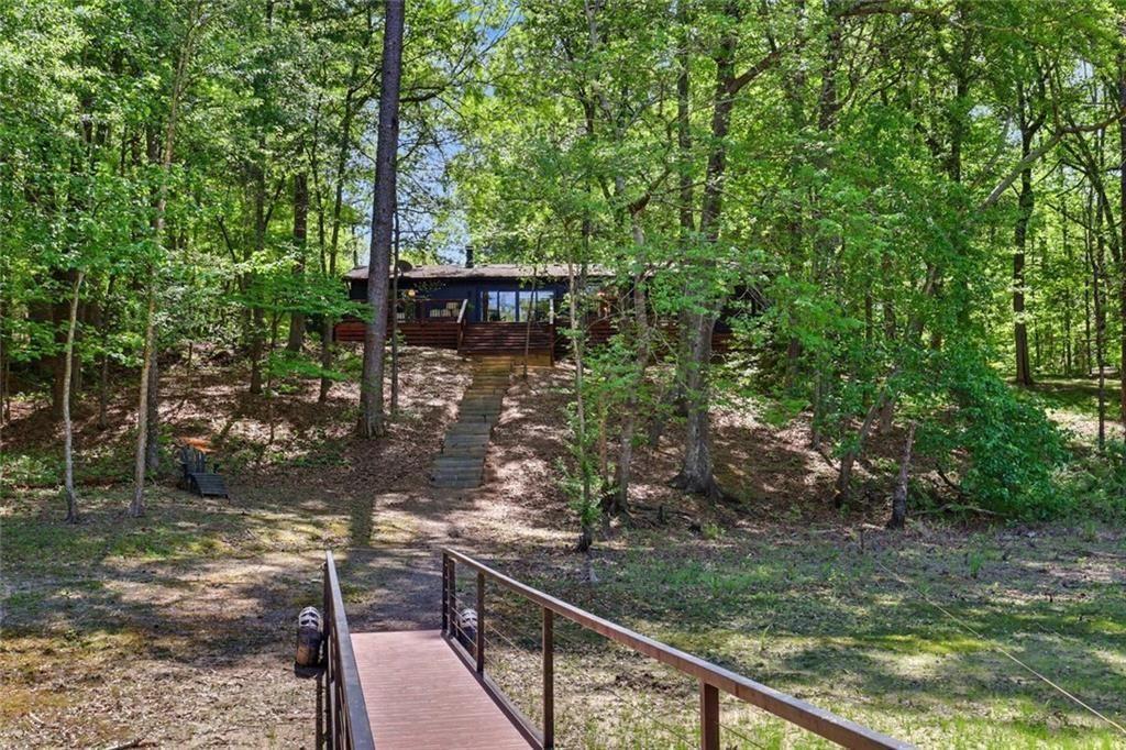 159 Manor Oak Trail Toccoa, GA 30577 - Photo 65 of 68 a view of a wooden deck and trees