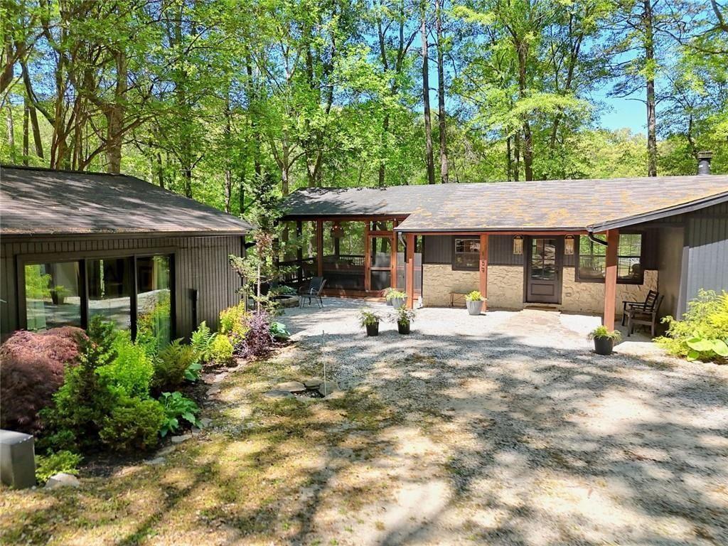 159 Manor Oak Trail Toccoa, GA 30577 - Photo 67 of 68 a front view of a house with a garden