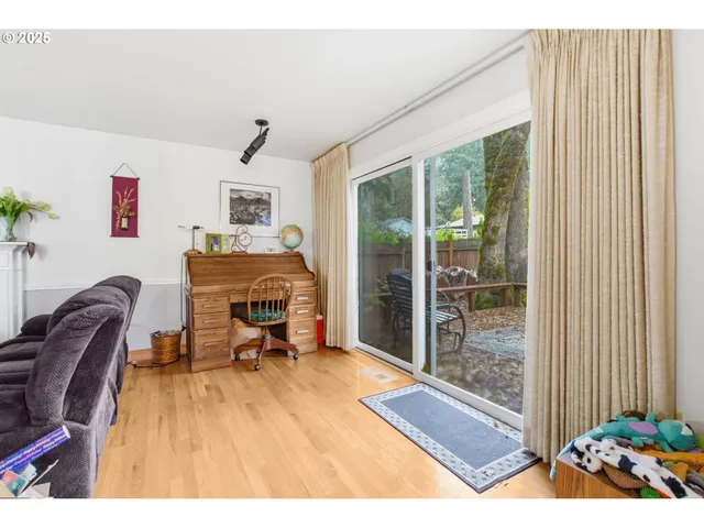 a workspace with furniture and a window