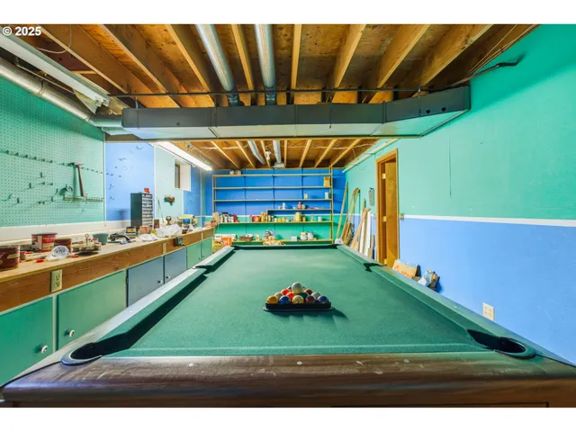 a kitchen with stainless steel appliances wooden cabinets and a refrigerator