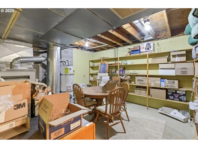 a view of a chairs and table in a room