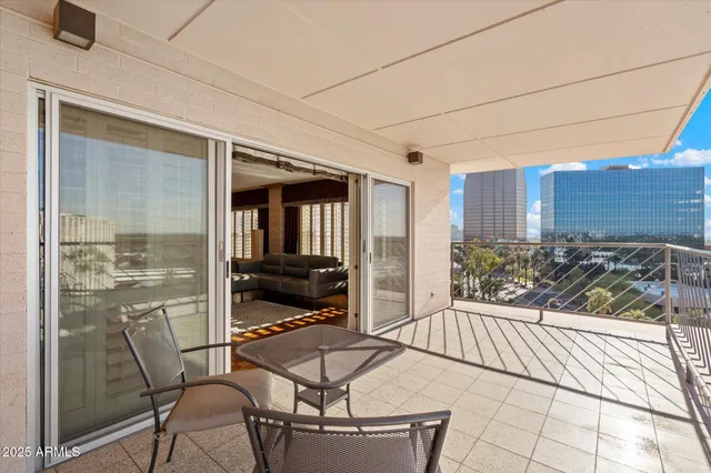 a outdoor space with the couches and dining table chair